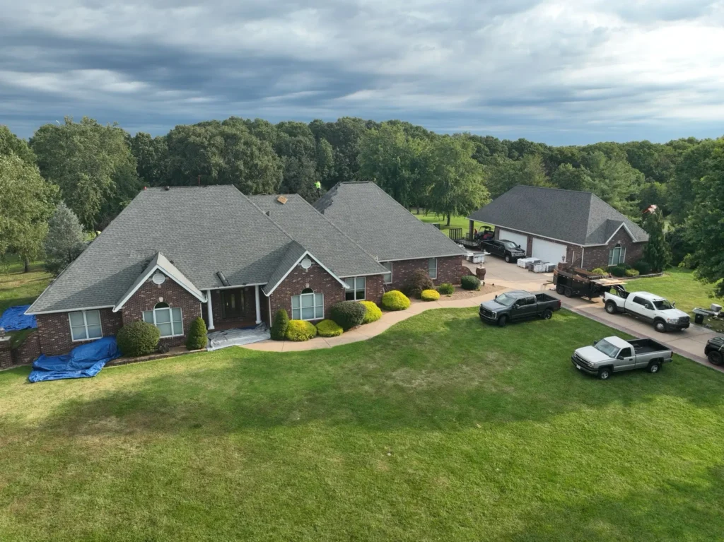 Green grass and new roof, aerial view