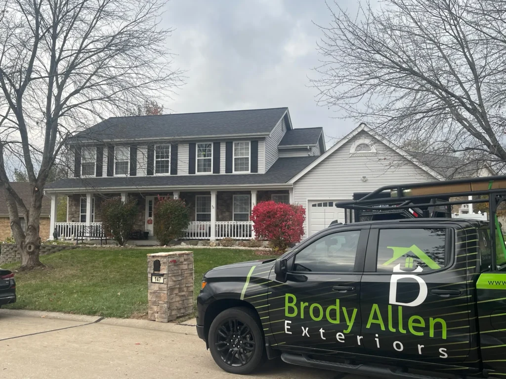 Finished roof with Brody Allen work truck in the front