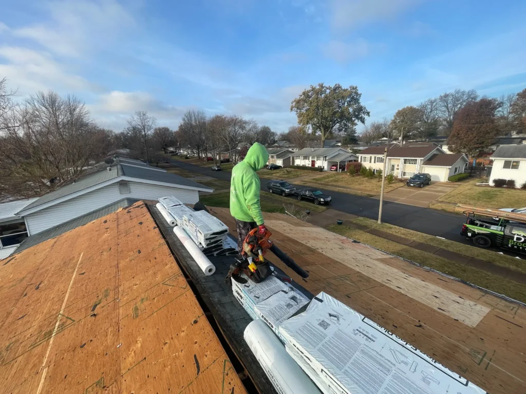 Roofer during job in winter.